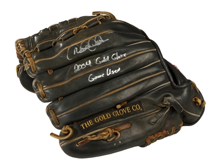 Derek Jeter Game Used and Signed Rawlings Glove Used For His 2004 First Gold Glove Winning Season and First Ever by a Yankee Shortstop (PSA/DNA -Steiner) Jeter Signed LOA
